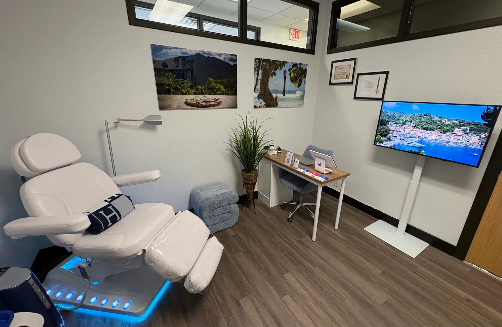 The whitening room at BrightSmile Studio, with the treatment chair and desk